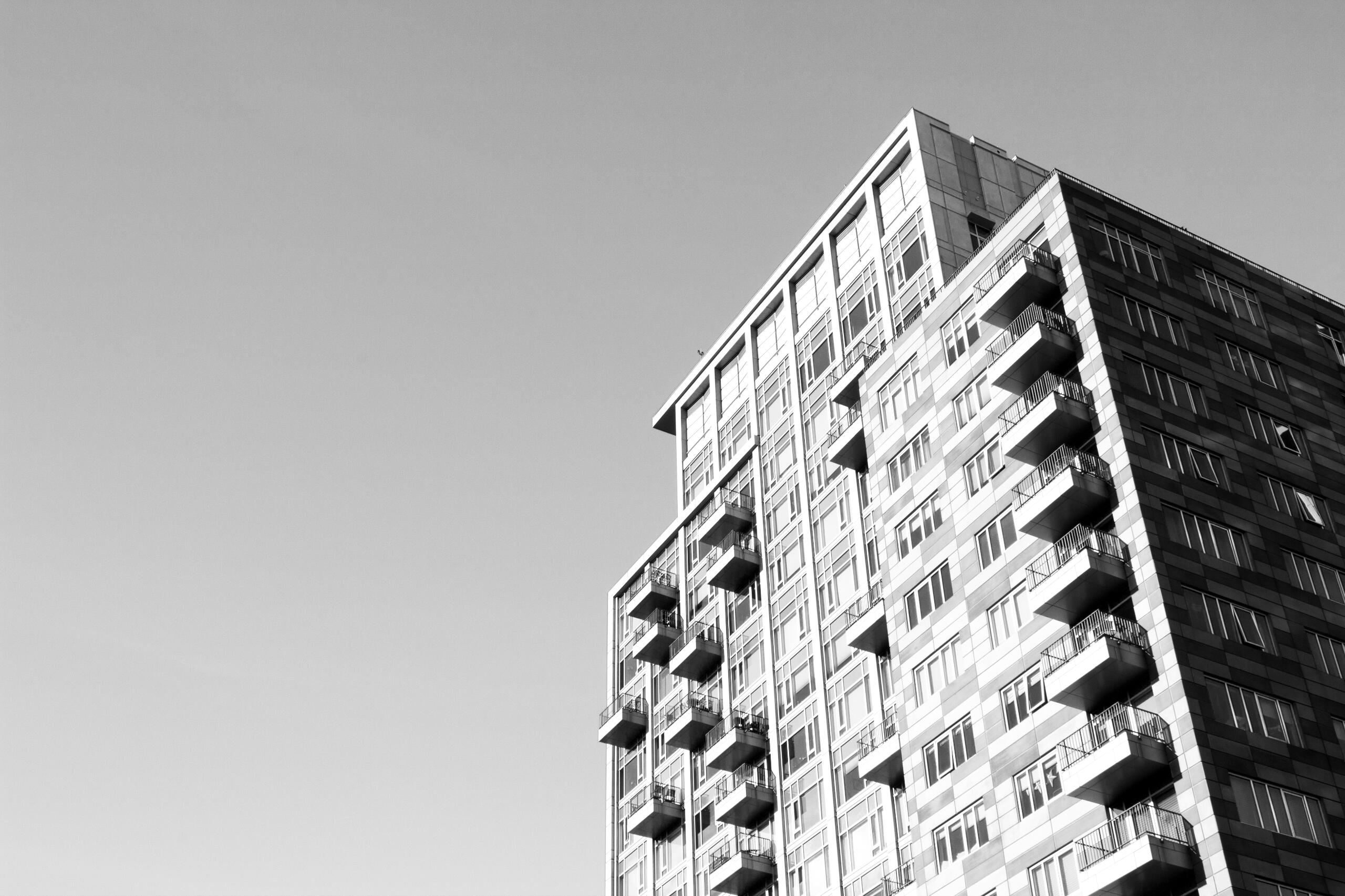 A black and white photo of a condo building in Providence